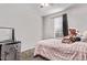 Bedroom with carpet, grey walls, and window for natural light at 2614 S 120Th Ave, Avondale, AZ 85323