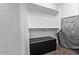 Walk-in closet with shelving and an ottoman at 2614 S 120Th Ave, Avondale, AZ 85323