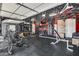 Well-organized garage gym with high ceilings and ample workout equipment at 30511 N 162Nd Way, Scottsdale, AZ 85262