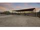 Fenced horse corral with overhead shelter at 30511 N 162Nd Way, Scottsdale, AZ 85262