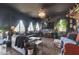 Comfortable living room with chandelier, lots of seating, decorative items, and natural light at 30511 N 162Nd Way, Scottsdale, AZ 85262