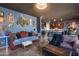 Open-concept living space featuring kitchen access and stylish decor and furnishings at 30511 N 162Nd Way, Scottsdale, AZ 85262