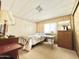 Bedroom with a comfortable bed and natural light at 318 S Crismon Rd # 65, Mesa, AZ 85208