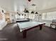 Spacious game room featuring pool tables and ample seating, perfect for entertaining at 318 S Crismon Rd # 65, Mesa, AZ 85208