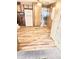 Charming kitchen featuring wood cabinets, white appliances, and new flooring at 318 S Crismon Rd # 65, Mesa, AZ 85208