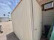 This property has an outdoor shed with a door, next to the home at 318 S Crismon Rd # 65, Mesa, AZ 85208