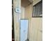 This is a close up of the water heater and thermostat, which is located in a closet at 318 S Crismon Rd # 65, Mesa, AZ 85208