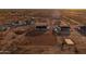 Expansive aerial view showcasing sprawling lots and various residences in a desert landscape at 34449 N Elk Run Rd, San Tan Valley, AZ 85143