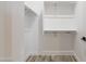 Walk-in closet includes shelving and hanging rods at 34449 N Elk Run Rd, San Tan Valley, AZ 85143