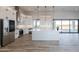 Spacious kitchen with a large island, modern appliances, and seamless flow to outdoor living at 34449 N Elk Run Rd, San Tan Valley, AZ 85143