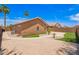 Backyard with landscaped yard, artificial turf, and a tiled patio at 3913 E Derringer Way, Gilbert, AZ 85297