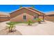 Backyard with landscaped yard, artificial turf, and tile pavers at 3913 E Derringer Way, Gilbert, AZ 85297
