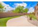 Backyard featuring landscaped yard, with palm trees and artificial turf at 3913 E Derringer Way, Gilbert, AZ 85297