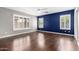 Beautiful bedroom with hardwood floors, neutral colors, and plantation shutters at 3913 E Derringer Way, Gilbert, AZ 85297