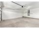 Spacious two-car garage with an automatic door and room for storage or a workbench at 3913 E Derringer Way, Gilbert, AZ 85297