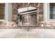 Gourmet kitchen featuring a stone archway over the sink and a view into the great room with beamed ceiling at 3913 E Derringer Way, Gilbert, AZ 85297
