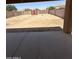 Spacious backyard with a shed, offering a private outdoor space for recreation and entertaining and block fence for privacy at 40246 W Hopper Dr, Maricopa, AZ 85138