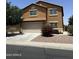 Two-story home with desert landscaping, attached two-car garage, and a neutral color palette at 40246 W Hopper Dr, Maricopa, AZ 85138