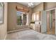 Spacious bedroom with a large picture window and built-in cabinetry for ample storage at 42023 N Bridlewood Way, Anthem, AZ 85086