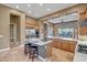 Kitchen with marble countertops, stainless steel appliances, and a center island with seating at 42023 N Bridlewood Way, Anthem, AZ 85086