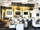 Stylish restaurant interior with a modern bar, comfortable seating, and contemporary design elements at 42023 N Bridlewood Way, Anthem, AZ 85086