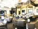 Well-appointed restaurant featuring a bar area, comfortable seating arrangements, and stylish decor at 42023 N Bridlewood Way, Anthem, AZ 85086