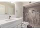 Beautifully updated bathroom with a modern vanity and tiled shower, offering a luxurious experience at 4901 S Calle Los Cerros Dr # 220, Tempe, AZ 85282