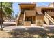Charming two-story condo with private entrance and a red-tiled roof under a clear blue sky at 4901 S Calle Los Cerros Dr # 220, Tempe, AZ 85282