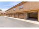 Row of attached garages, providing private parking for residents at 4901 S Calle Los Cerros Dr # 220, Tempe, AZ 85282