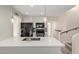Modern kitchen features a quartz island, stainless steel appliances, and a stylish backsplash at 4901 S Calle Los Cerros Dr # 220, Tempe, AZ 85282