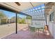 Backyard patio featuring a pergola and view of desert landscaping for relaxation and outdoor enjoyment at 5133 E Keresan St, Phoenix, AZ 85044