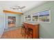 Inviting bar area featuring natural light, tile countertop and seating for casual dining at 5133 E Keresan St, Phoenix, AZ 85044