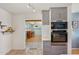 Stylish built-in oven and drawer storage near the bar area at 5133 E Keresan St, Phoenix, AZ 85044