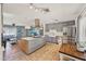 Well-designed kitchen with a large island and stainless steel appliances at 5133 E Keresan St, Phoenix, AZ 85044