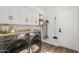 Functional laundry room with modern appliances and ample storage at 5556 E Sandra Ter, Scottsdale, AZ 85254