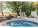 Secluded backyard with pool, patio, lounge chair, and mature landscaping at 5556 E Sandra Ter, Scottsdale, AZ 85254
