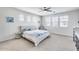 Bedroom featuring three windows, a bed, and small decor at 651 N Bay Dr, Gilbert, AZ 85233