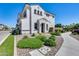 A two-story home showcasing a landscaped front yard and charming curb appeal at 651 N Bay Dr, Gilbert, AZ 85233