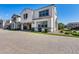 Beautiful two-story home with a tile roof and well-maintained landscaping at 651 N Bay Dr, Gilbert, AZ 85233