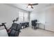 Another view of a home office featuring a desk and exercise bike at 651 N Bay Dr, Gilbert, AZ 85233