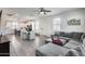 A combined living and dining space with an open layout and abundant natural light at 651 N Bay Dr, Gilbert, AZ 85233