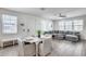 Inviting living area featuring neutral color palettes, comfortable seating, and lots of natural light at 651 N Bay Dr, Gilbert, AZ 85233