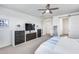 Spacious main bedroom with large dresser, ceiling fan, and white walls for a relaxing retreat at 651 N Bay Dr, Gilbert, AZ 85233