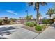 Community pool area with lush landscaping and gated entry at 651 N Bay Dr, Gilbert, AZ 85233