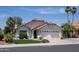 Charming single-story home featuring a well-maintained yard, desert landscaping, and a two-car garage at 6732 W Sack Dr, Glendale, AZ 85308