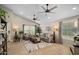 Bright living room featuring vaulted ceilings, a large rug, and neutral decor, creating a warm and inviting atmosphere at 6732 W Sack Dr, Glendale, AZ 85308