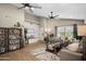 Spacious living room with vaulted ceilings, warm tones, a cozy rug, and ample natural light at 6732 W Sack Dr, Glendale, AZ 85308