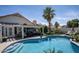 Inviting backyard pool and patio area, perfect for entertaining, with a covered patio and manicured landscaping at 6732 W Sack Dr, Glendale, AZ 85308
