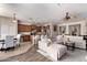 Spacious living room with a comfortable sofa and open floor plan at 7241 W Donner Dr, Laveen, AZ 85339
