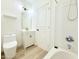 Bathroom featuring a bathtub, vanity with gold fixtures, and a toilet at 733 E Megan Dr, San Tan Valley, AZ 85140